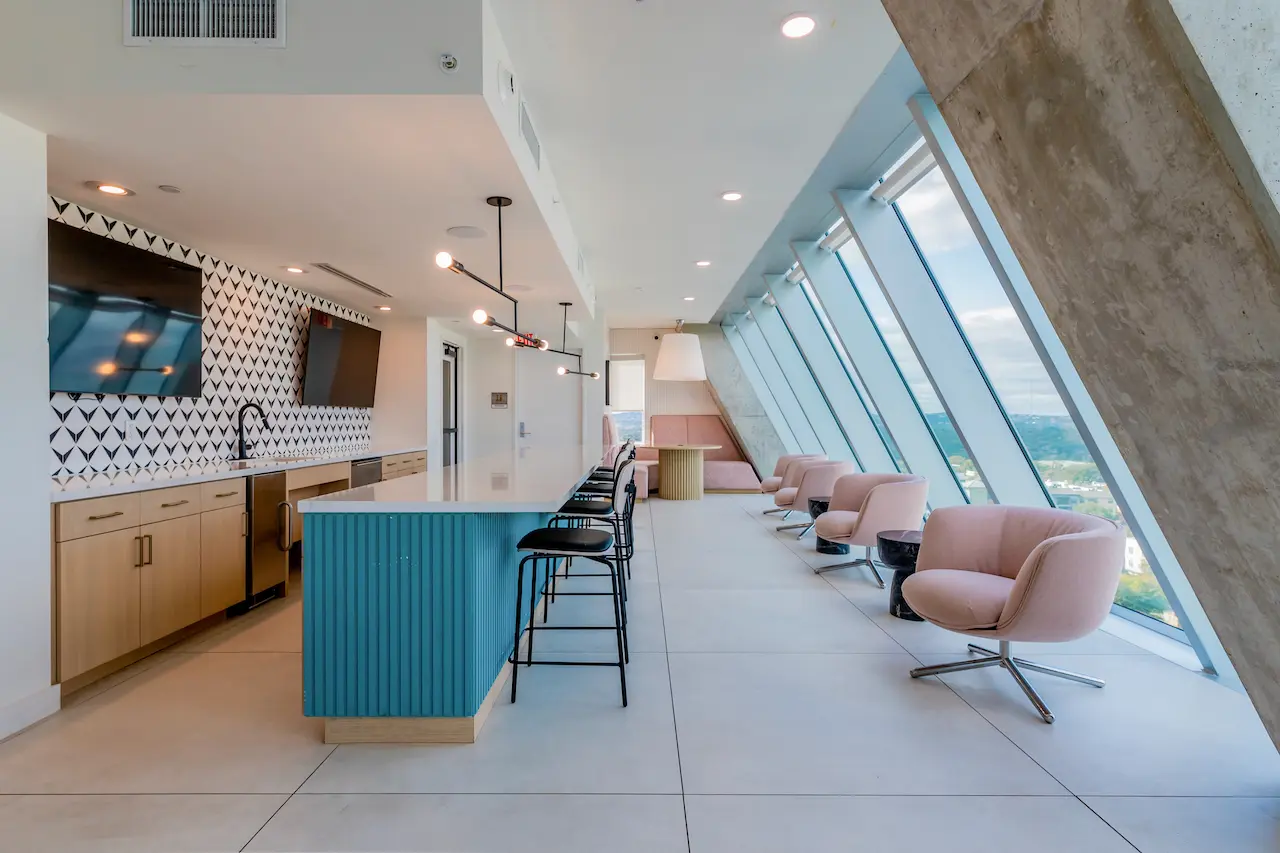 luxury student high-rise clubhouse with floor to ceiling windows and large bar seating